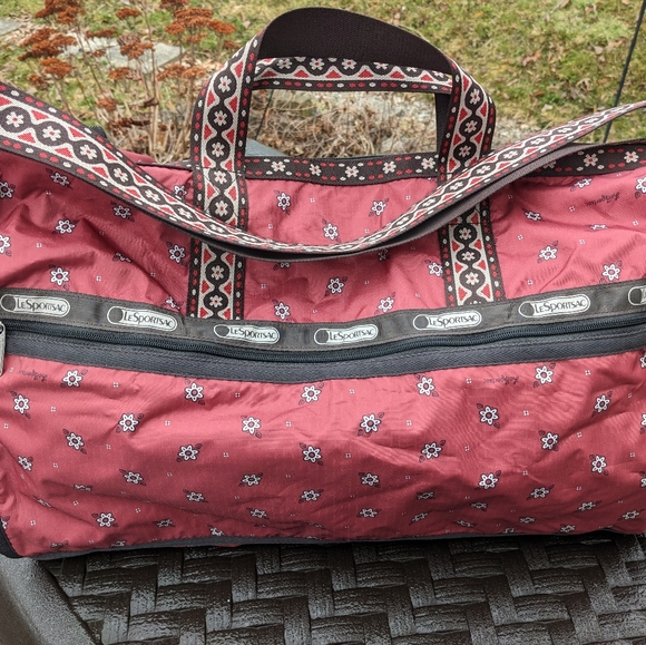 Lesportsac Handbags - Huge Lesportsac Flower Print Duffel Bag with Strap